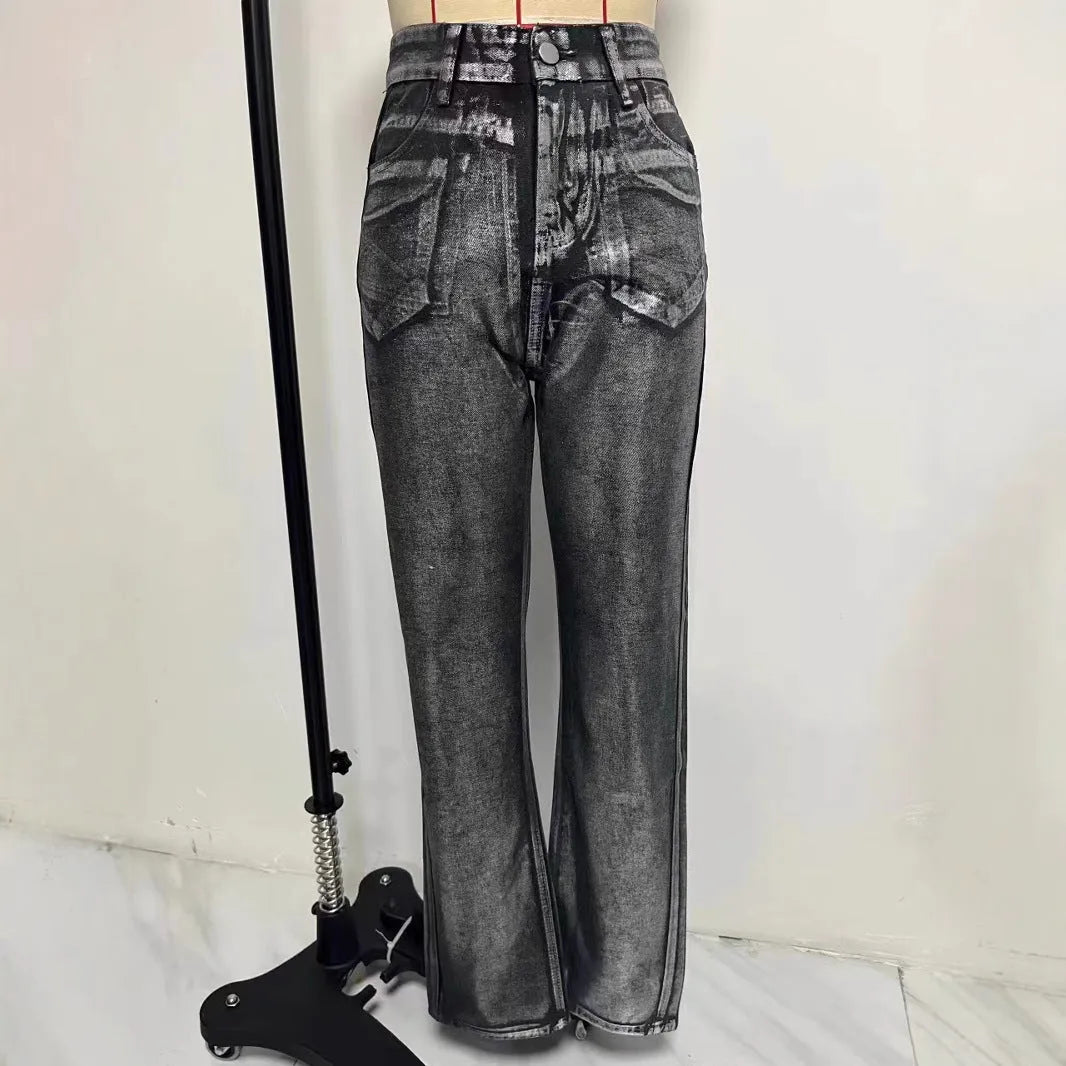 Women's high waist straight leg jeans in washed blue denim with silver contrast details