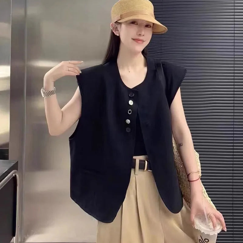 Women's polyester vest in milky white with pocket detail and loose fit design