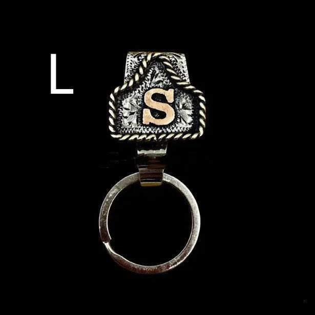 Handmade stainless steel cow tag belt key holder with engraved number plate on a split ring.