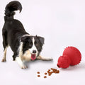 Natural rubber pet toy resistant to biting and grinding, treat dispensing ball in red, 11.3 by 8.5 cm