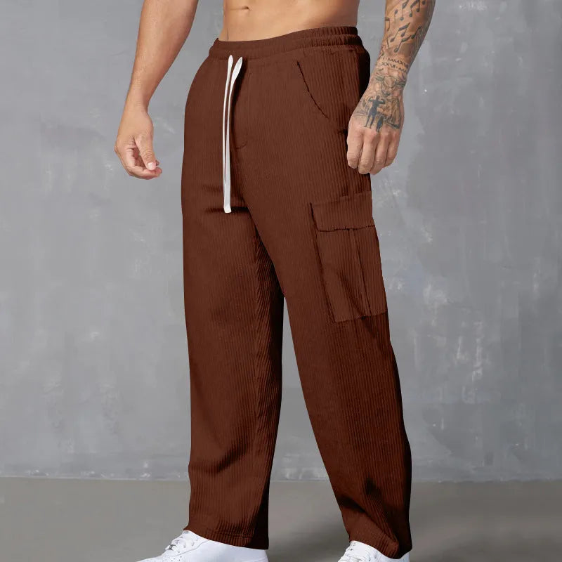 Men's straight-leg corduroy cargo trousers in brick red with a drawstring waist