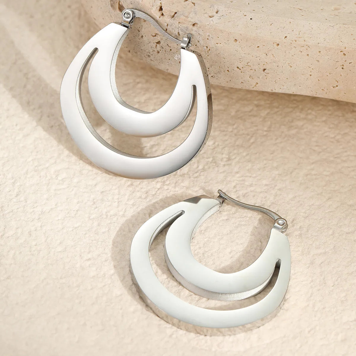 Geometric French earrings gold plated and steel plated minimalist jewellery with round ring elements