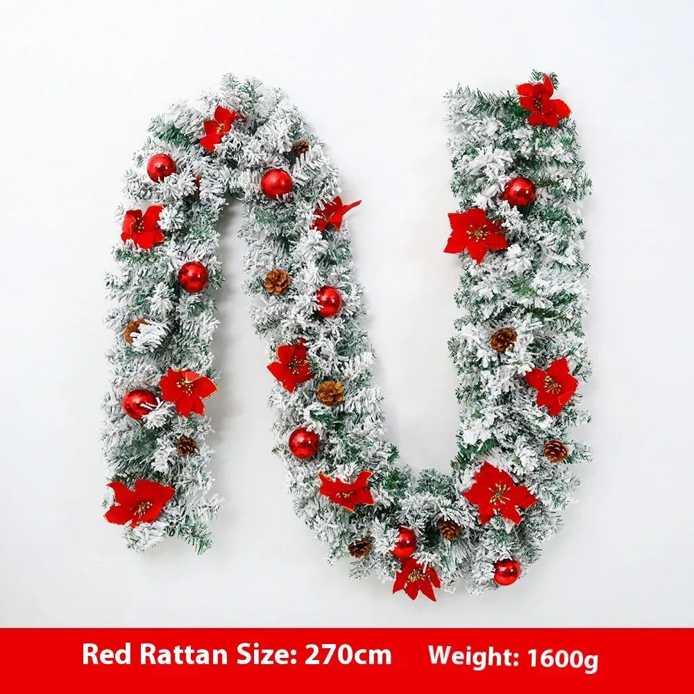 PVC Christmas rattan garland with flocked decoration in golden colour, draped to show texture and length.