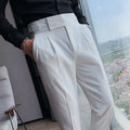 Men's straight-leg casual trousers in a solid colour, shown in a neutral grey shade on a hanger.