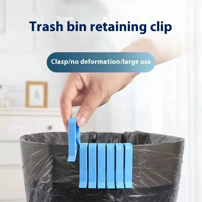 White PP plastic non-slip clip holding a black bin liner to the side of a silver kitchen trash can.