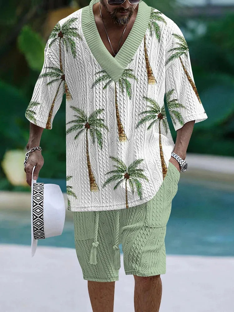 Man wearing a loose fit casual short sleeve top and matching shorts suit set