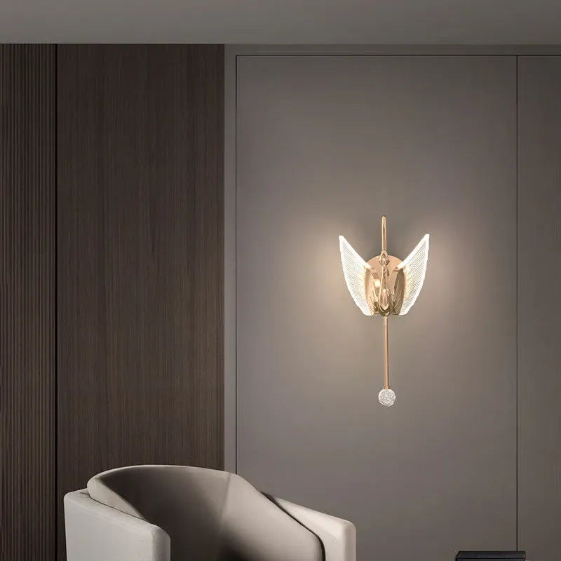 Gold modern swan-shaped wall-mounted bedside lamp with acrylic shade and dimmable LED light.
