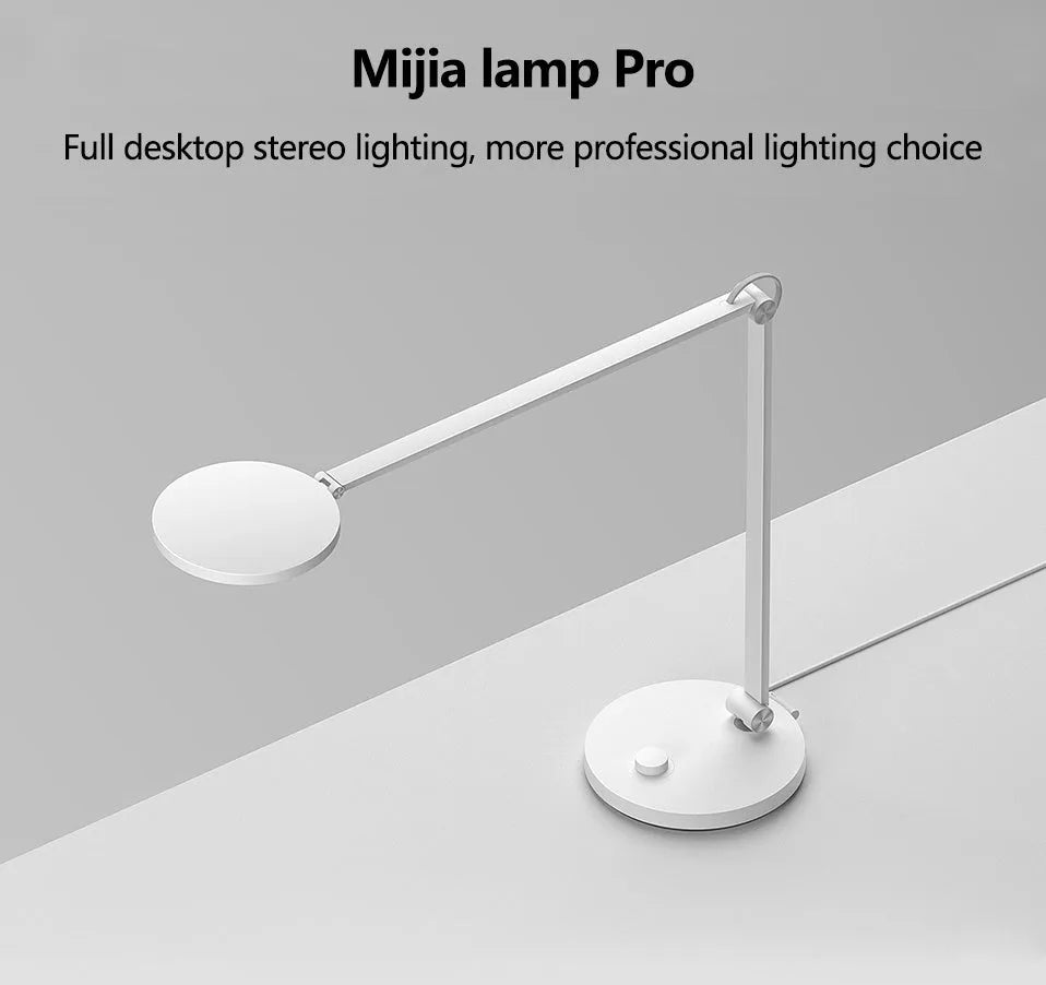 ProLED folding desk lamp with adjustable arm and modern design on a wooden desk
