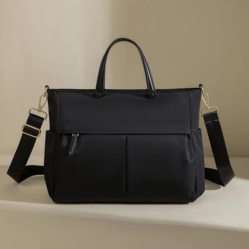 Women's Oxford cloth laptop bag with open pockets showing elegant black and nuts apricots colour options
