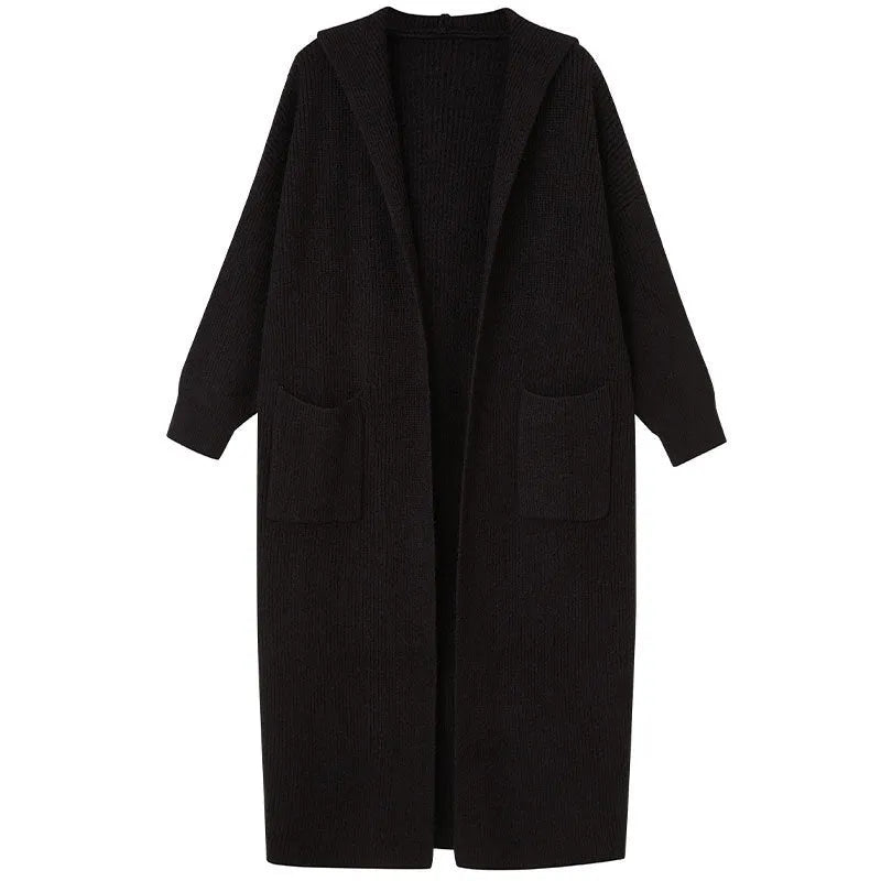 Long grey knitted hooded cardigan trench coat on a hanger, showing loose fit and long sleeves.