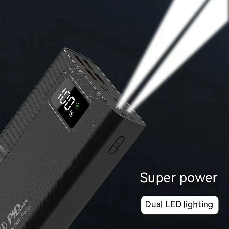 Large capacity power bank in black or white with plastic shell and multiple charging capacity options