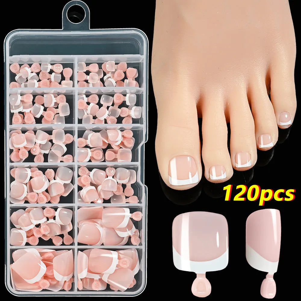 Open box showing 120 French white tip nude square false toe nails in assorted shades.