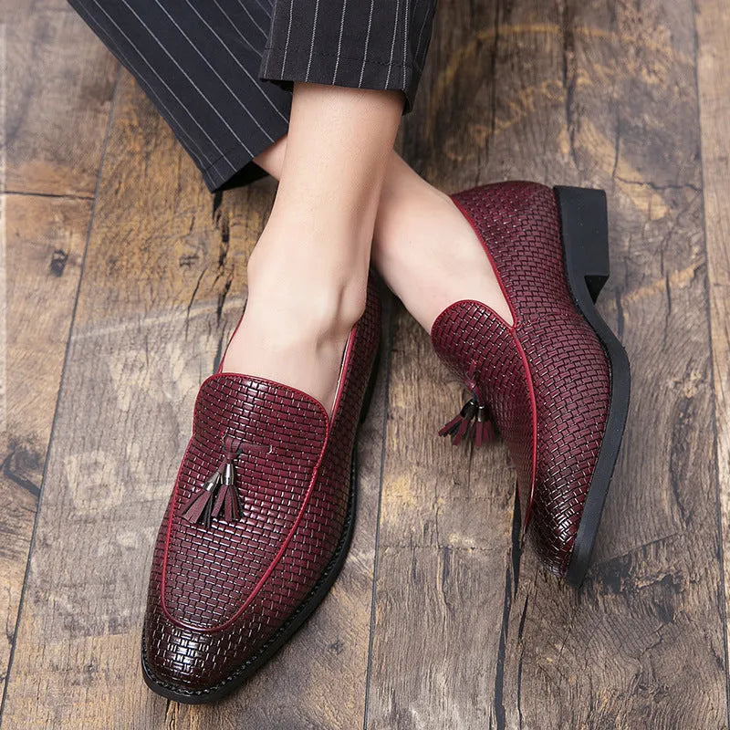Men's black pointed toe slip-on business shoes with decorative tassel on artificial PU upper