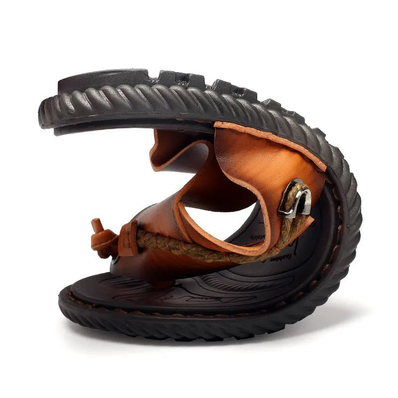 Men's dark blue herringbone pattern outdoor slippers with a rubber sole, shown from the side.