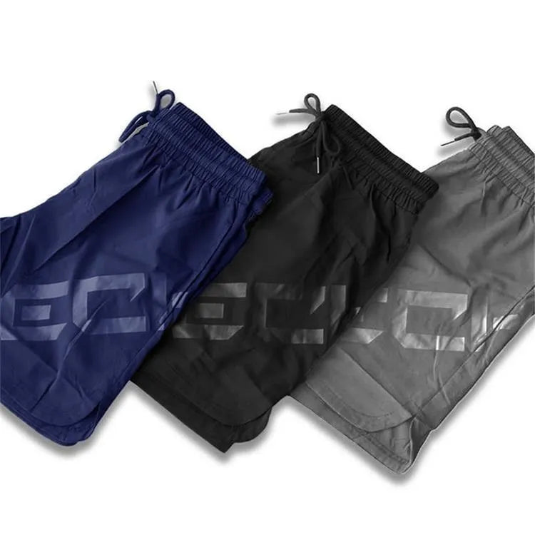 Men's elastic training shorts in quick-drying nylon blend fabric for summer sports