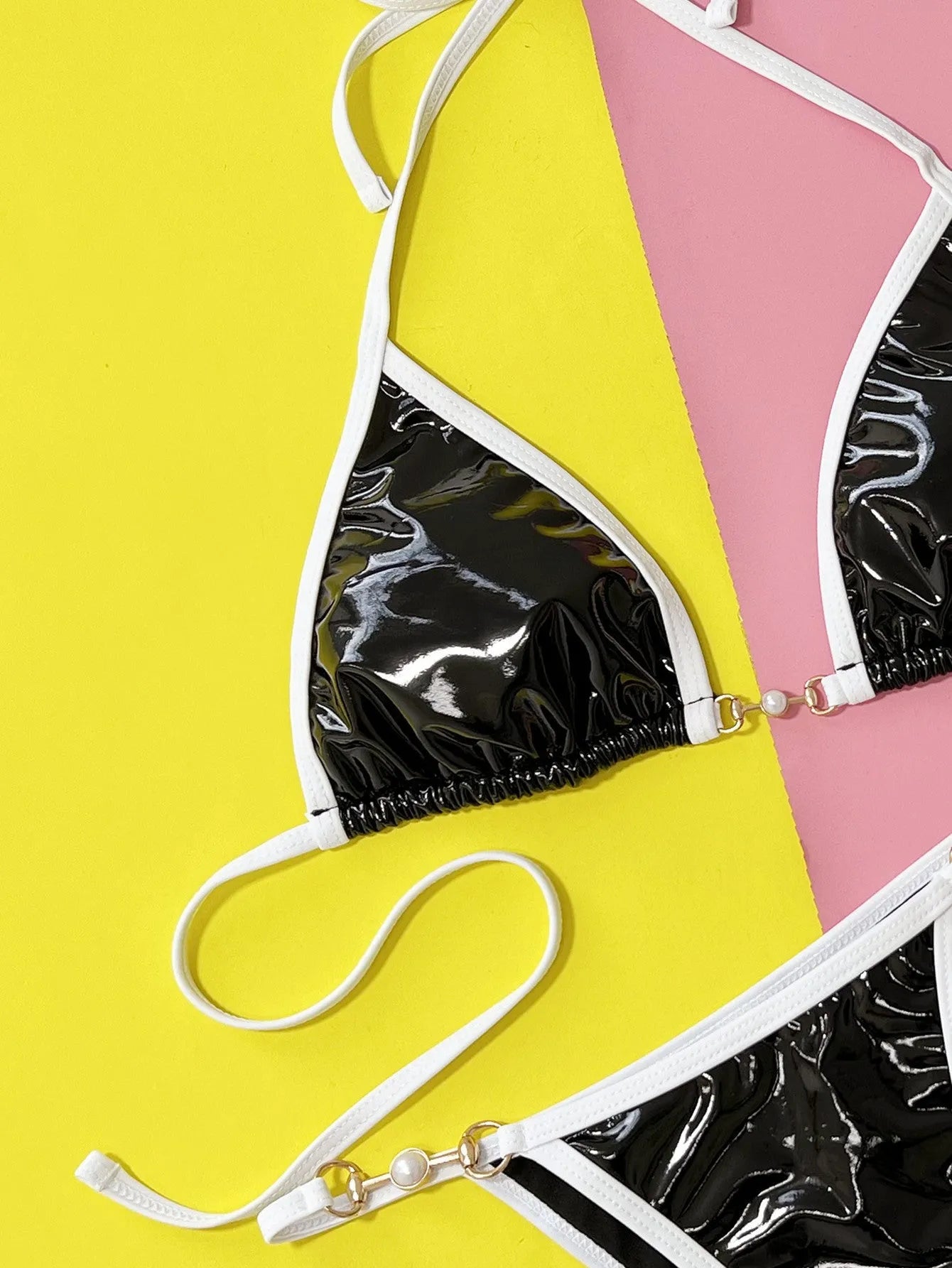 Black women's two-piece swimsuit with solid colour design for swimming