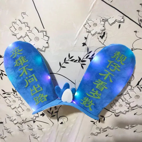 Rabbit Glow Ears helmet ornament with Velcro bottom in multiple colour options including blue, yellow, red, and purple.