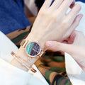 Women's retro marble watch with 32mm round dial, alloy strap, and titanium case back on white background