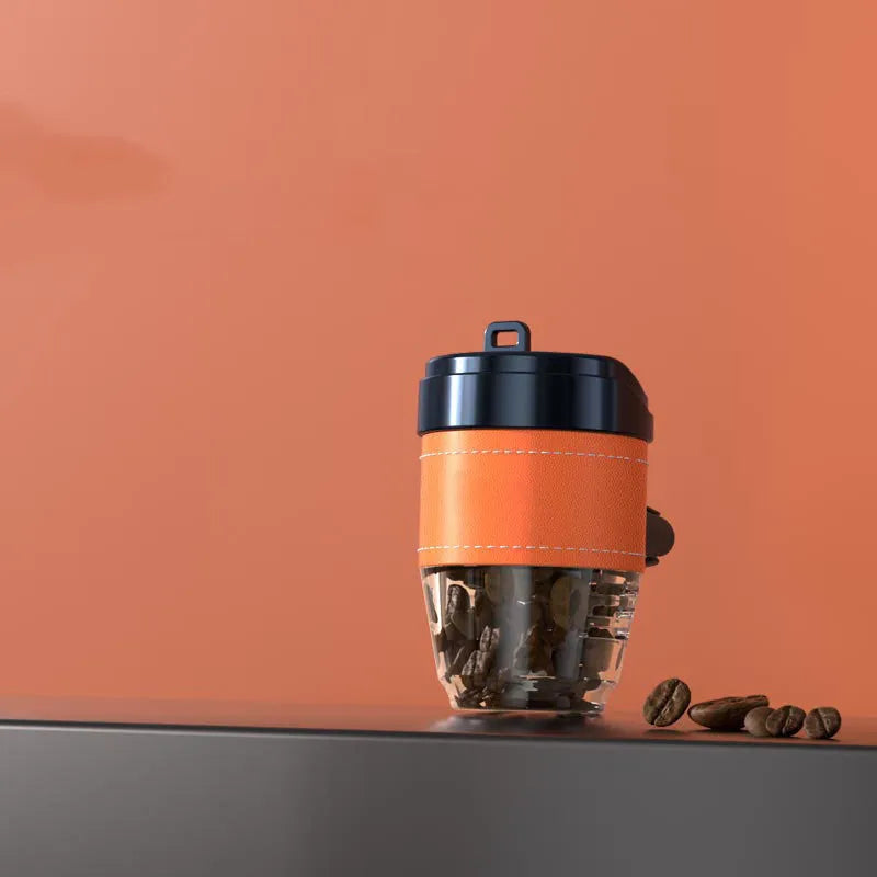 Solid coffee bean car air freshener shaped like a coffee cup on a car dashboard.
