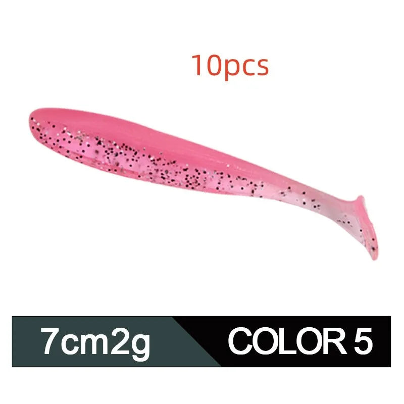 Soft plastic T-tail fishing lure in two-tone mandarin fish pattern, 7cm long.