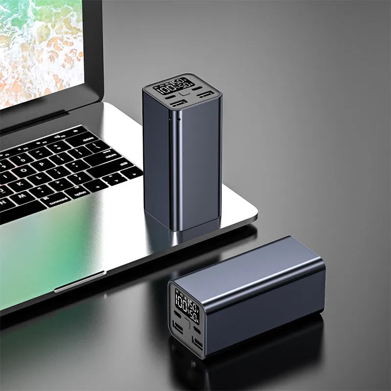 65W metal power bank with 20000mAh capacity for laptop charging, shown in black, blue, or grey.