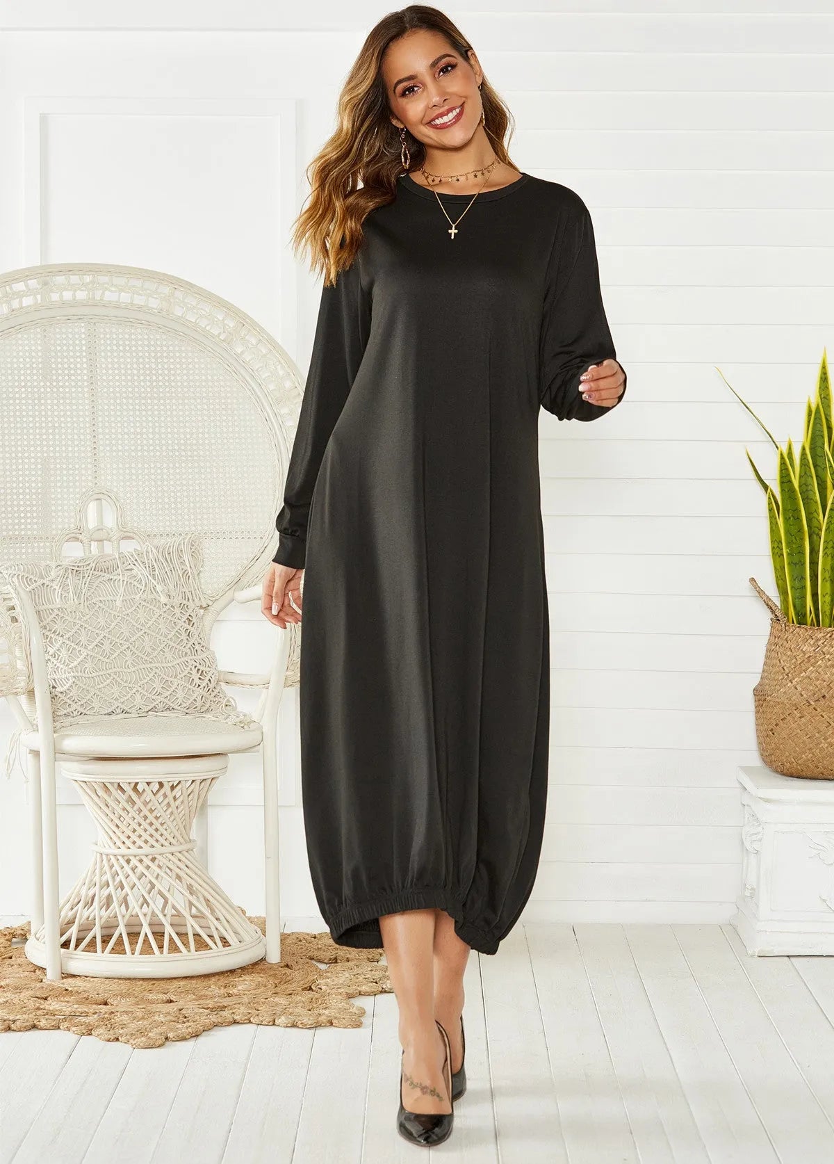 Black lantern dress with lace-up crew neck and loose silhouette for casual wear