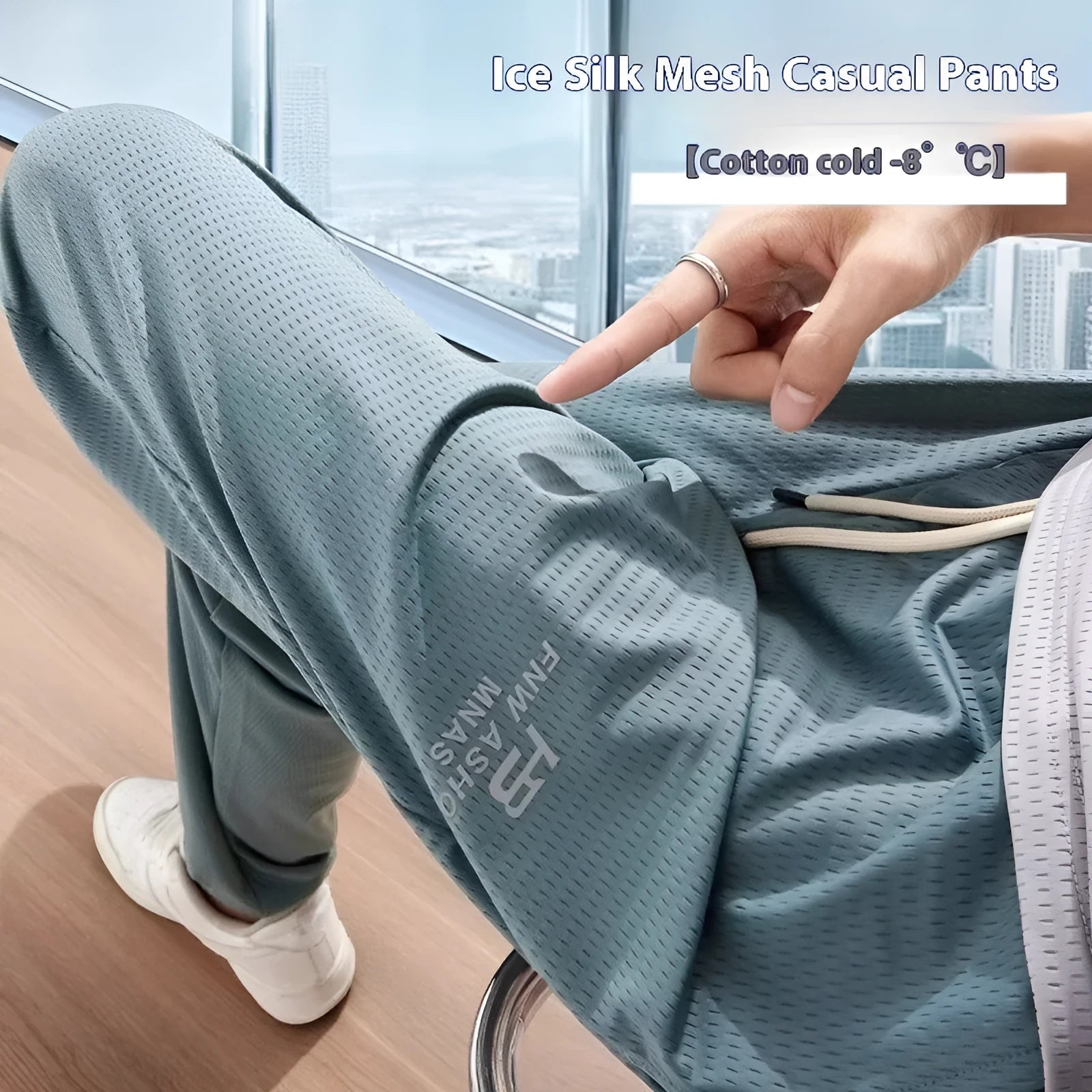 Men's ice silk thin breathable quick-drying casual pants in black, loose straight-leg style with drawstring waist