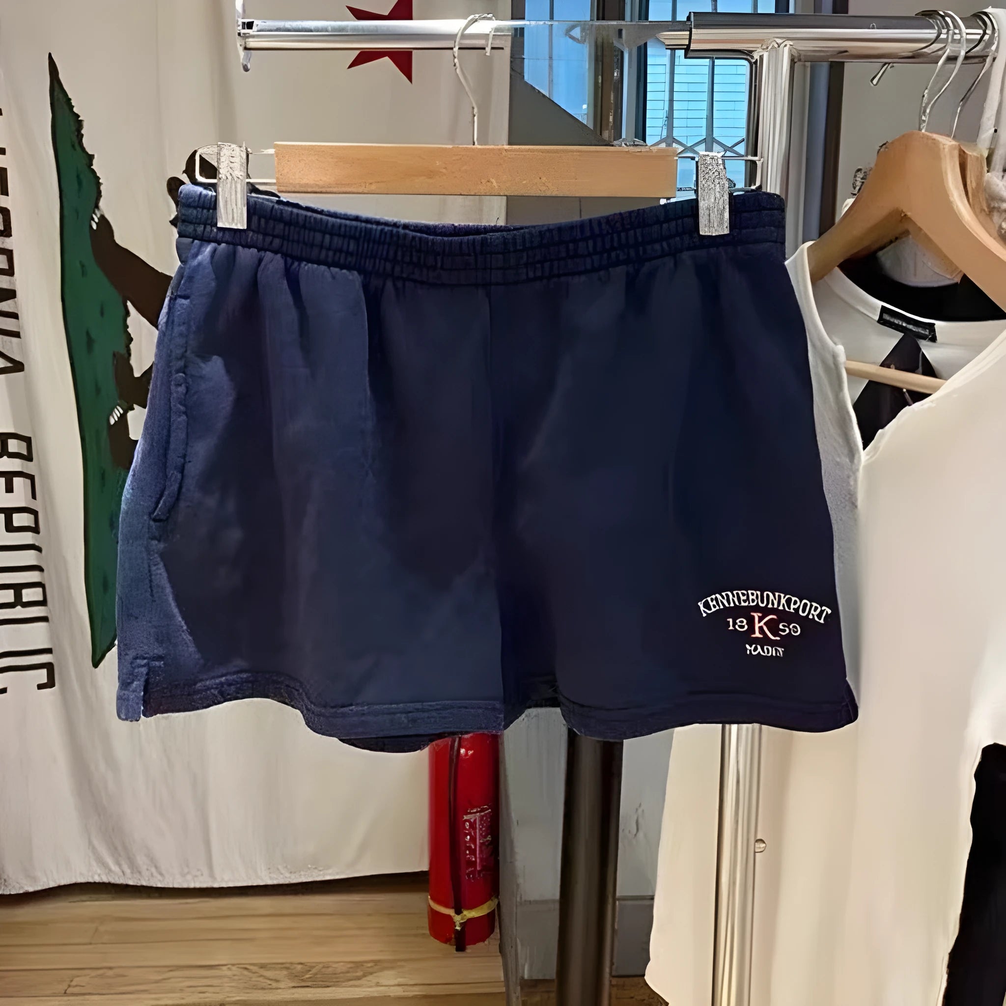 Women's dark blue cotton sports hot pants with white flag embroidery, high top style shorts