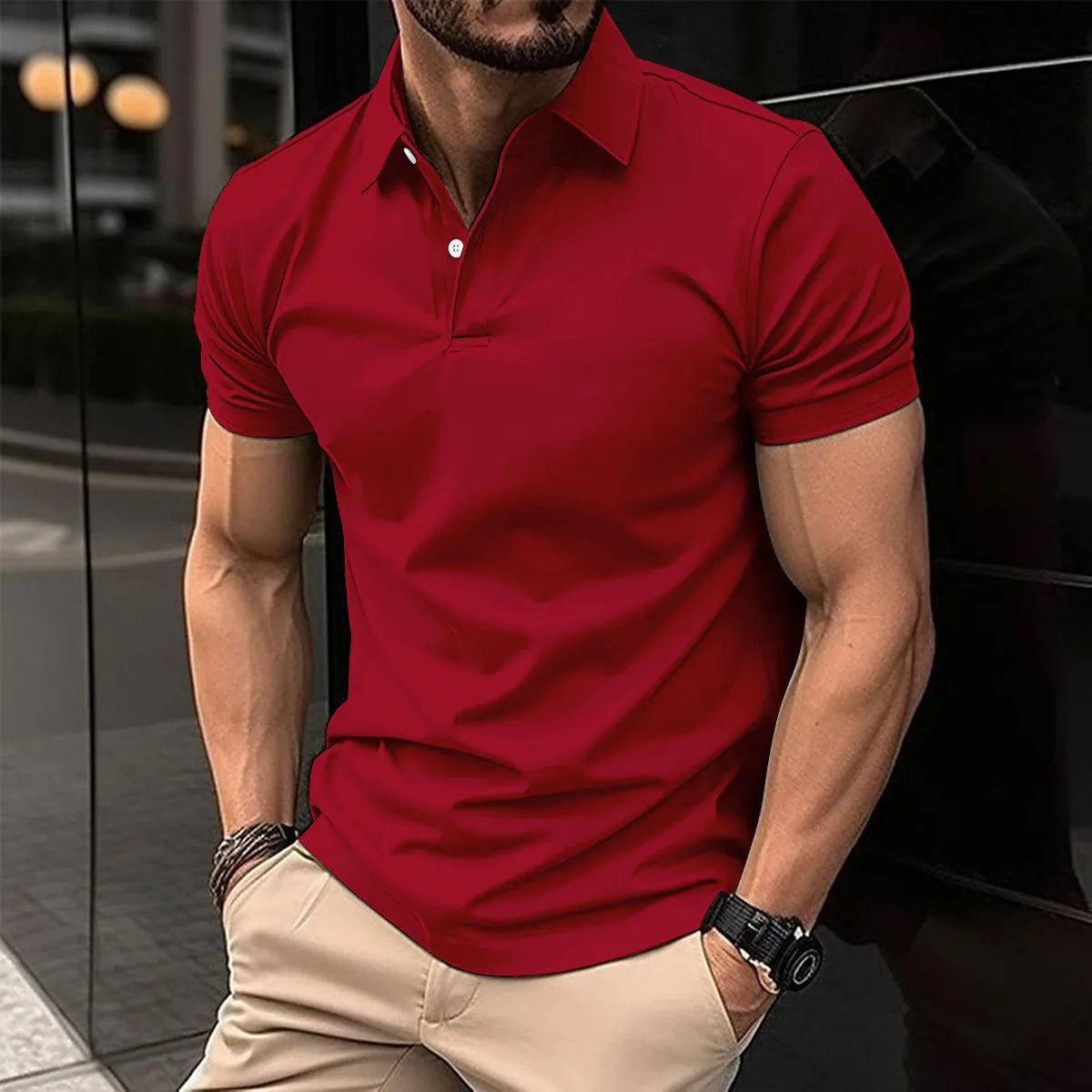 Men's solid colour short sleeve polo shirt with buttoned lapel collar on a hanger.
