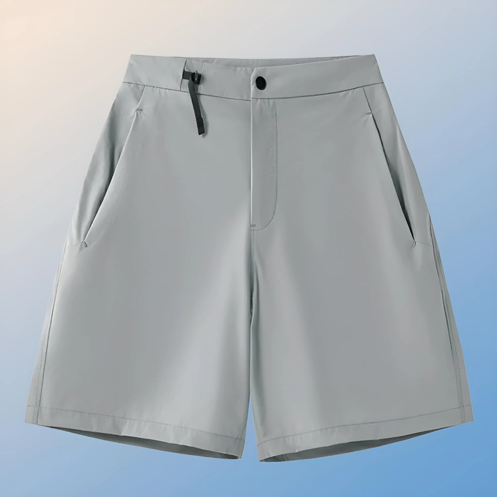 Men's solid colour quick-dry sports shorts with elastic waistband on a grey background.