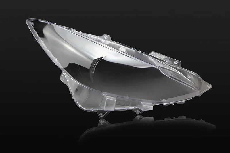 Mazda 3 Exela headlamp cover replacement part with snake glue adhesive for 14-16 or 17-19 models.