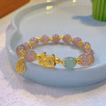 Women's floral glazed glass bracelet with animal zodiac charms in red, pink and white bead colour variations