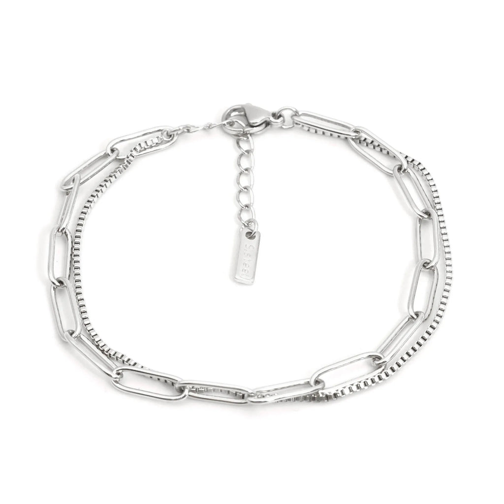Gold and silver geometric double-layer stainless steel women's bracelet with linear design.