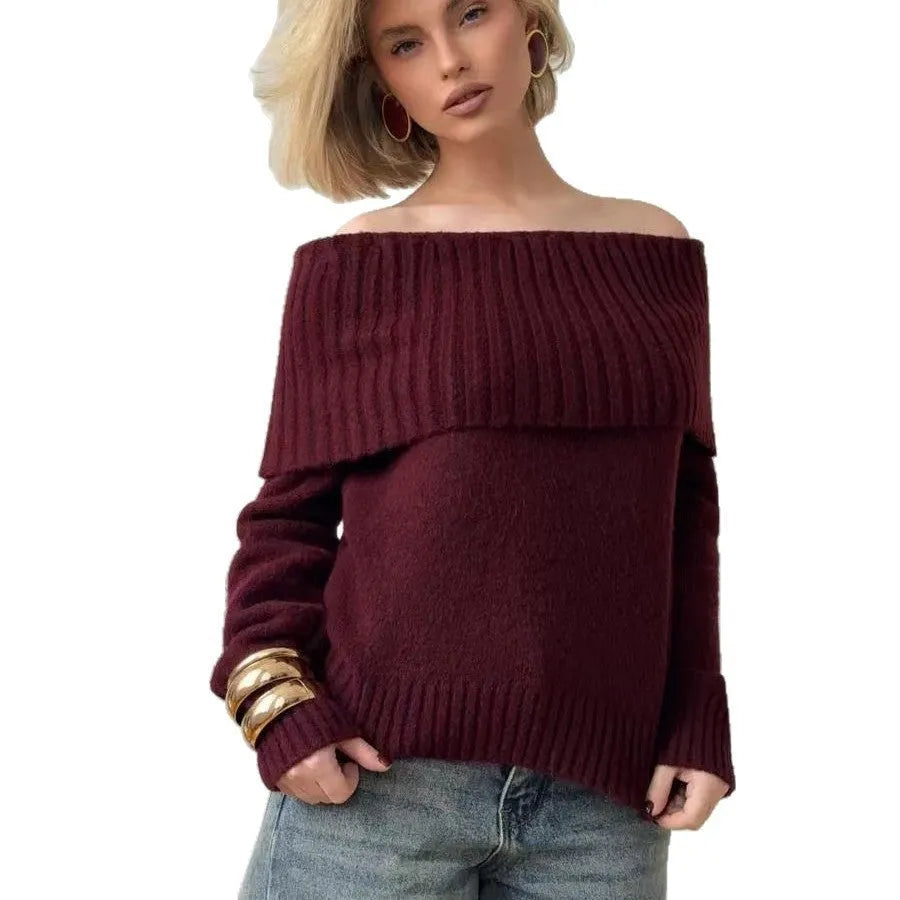 Grey off-the-shoulder strapless sweater with a 3D textured pattern and regular sleeves.