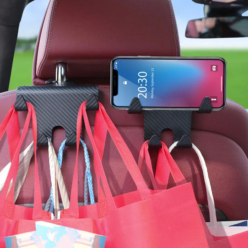 Black ABS plastic car hook with integrated mobile phone holder bracket for rear seat backs.