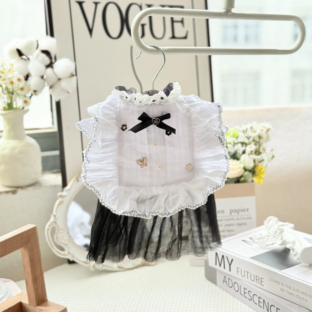 White polyester waltz gauze skirt costume on a small dog, showing princess style and lightweight fabric.