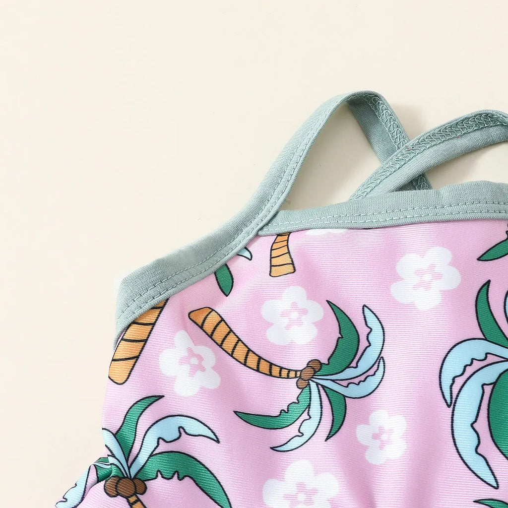 White children's two-piece swimsuit set with top and beach shorts on hanger