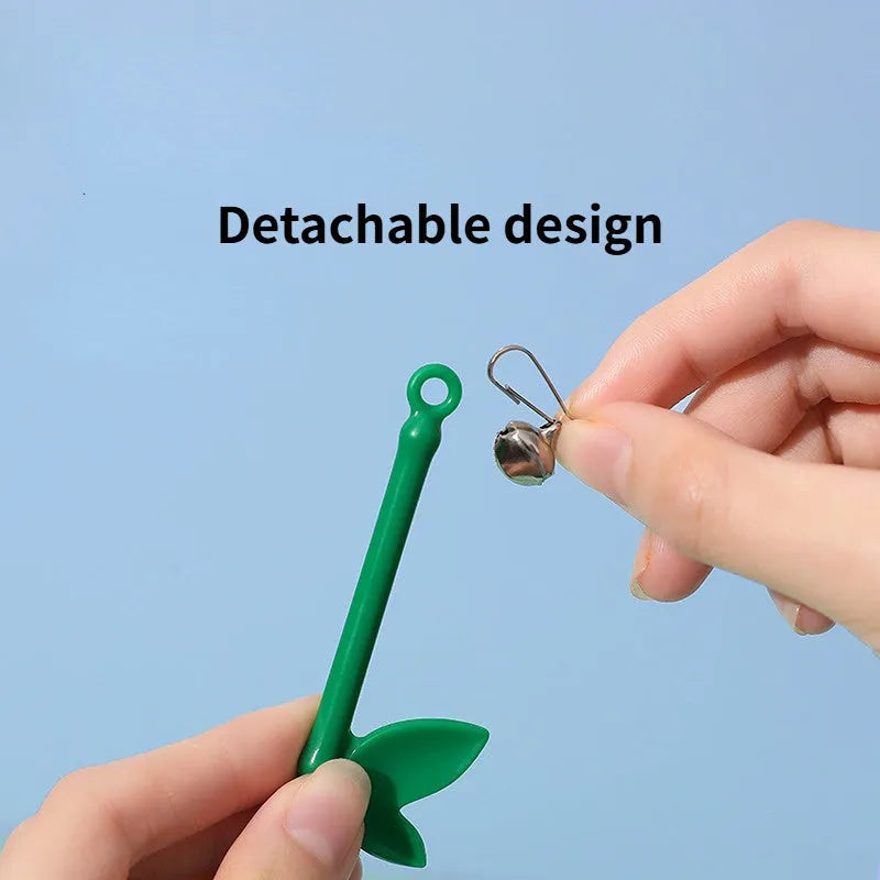 Green interactive cat feather wand toy with bell attachments for feline exercise and training