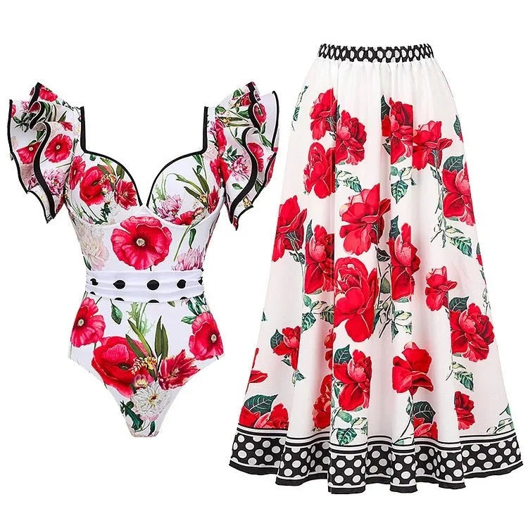 Women's printed polyester one-piece swimsuit on a hanger.