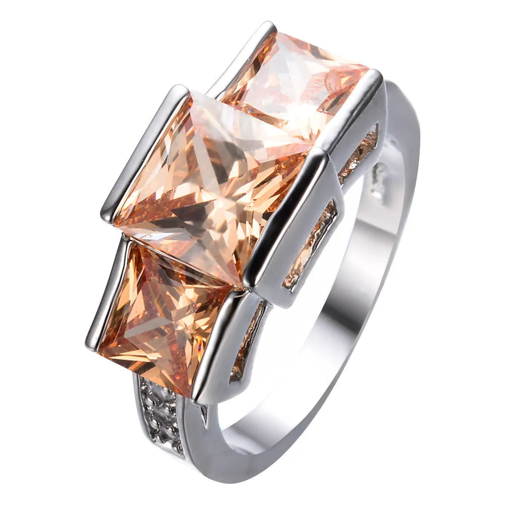 Copper women's ring with electroplated colour finish in geometric design showing multiple colour options