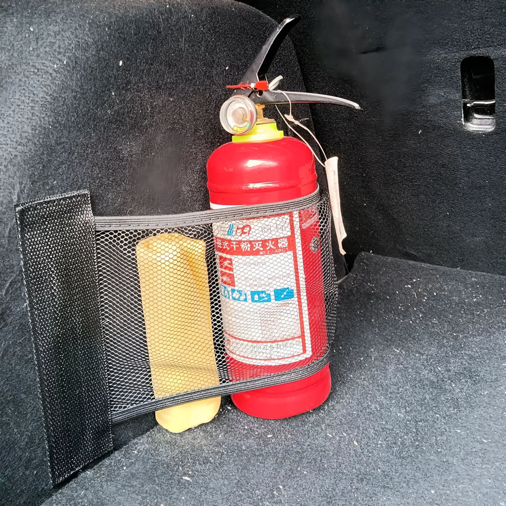 Car trunk elastic storage net organising loose items in vehicle boot