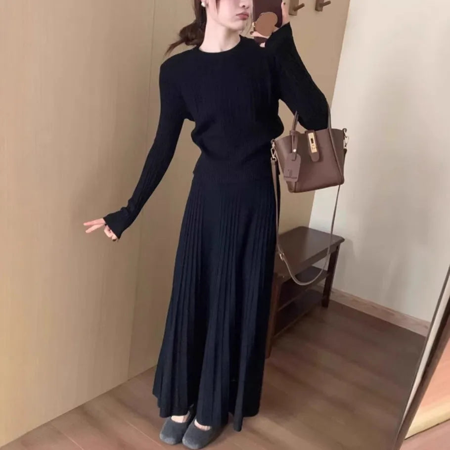Knitted dress suit set with 3D pattern ethnic style showing sweater and skirt coordination in dark grey colour