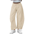 Loose grey cropped sweatpants with elastic drawstring waist and pockets on a mannequin