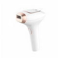 Pink and white three-in-one ice-sensing laser hair removal device with glasses and shaver