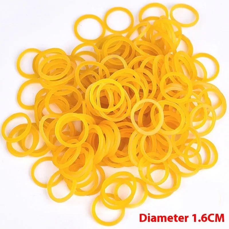 500g pack of assorted large yellow rubber bands in sizes from 25mm to 70mm diameter.