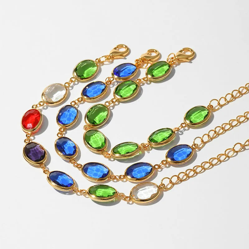 Women's geometric ellipse bracelet with 18K copper and coloured glass inlay beads in blue, green, and multicolour options