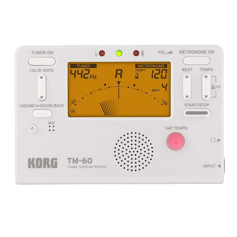 TM-60 black and white universal electronic metronome and tuner on a table.