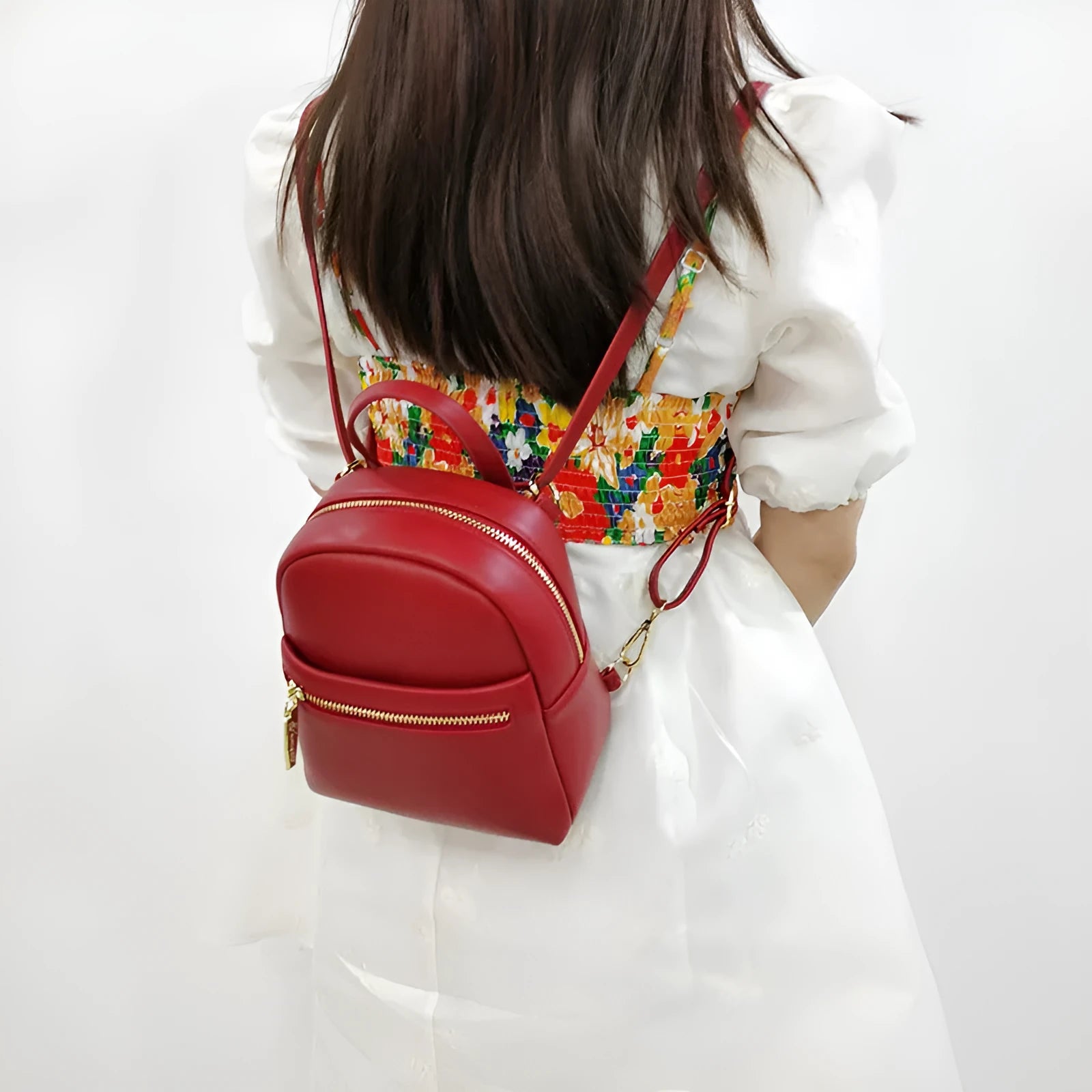 Soft PU mini backpack in six colour options showing three-dimensional pockets and street style design