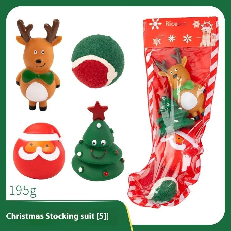 Christmas vinyl dog toy set with Santa Claus heads, trees, tennis balls, and bite ropes