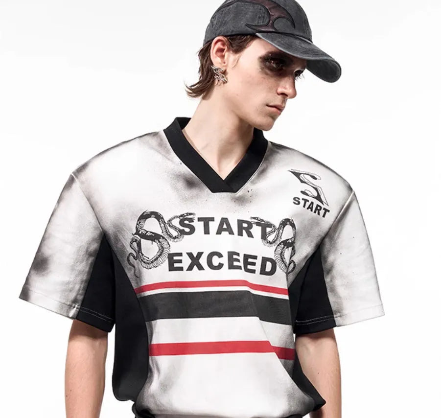 Black and white letter snake pattern printed women's V-neck short sleeve top with padded shoulders.